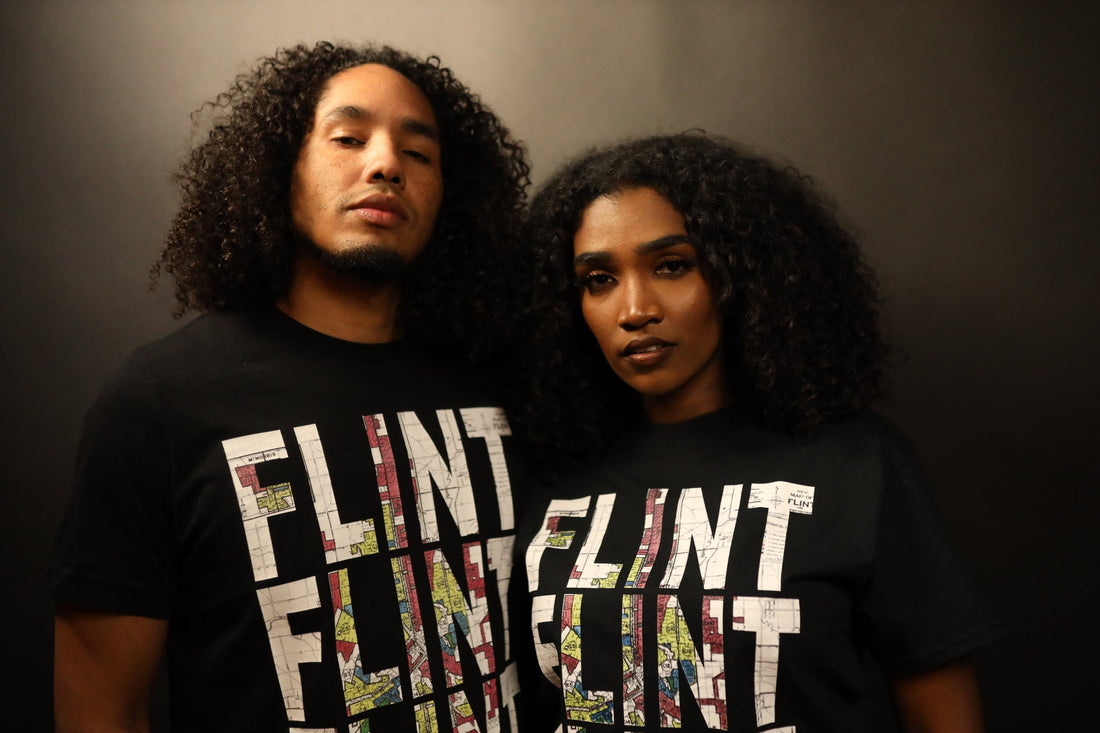 Flint REDLINE shirt printed with the real 1930s HOLC redlining map of Flint, Michigan.