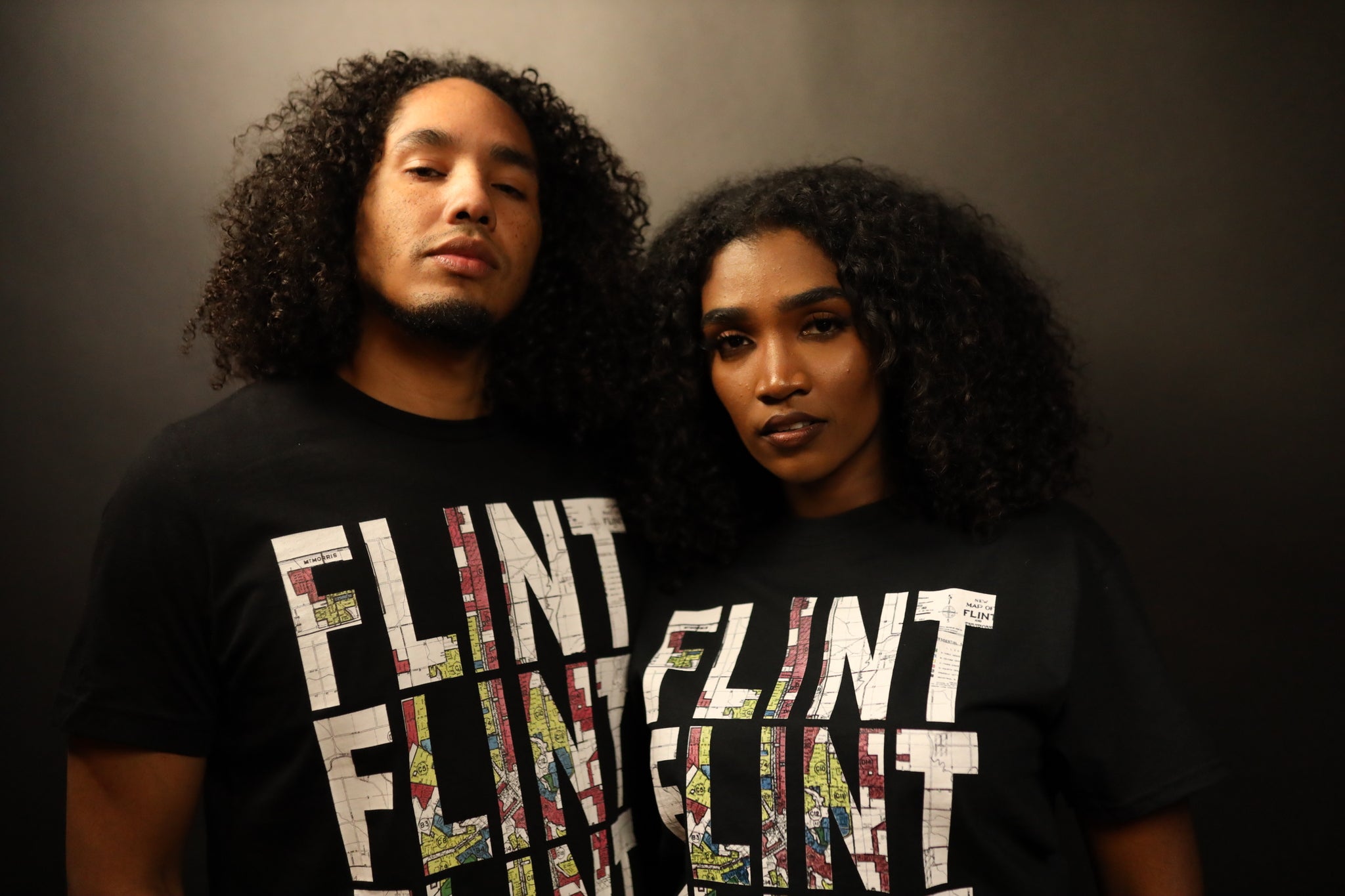 Flint REDLINE T-shirt printed with the real HOLC redlining map of Flint, Michigan.